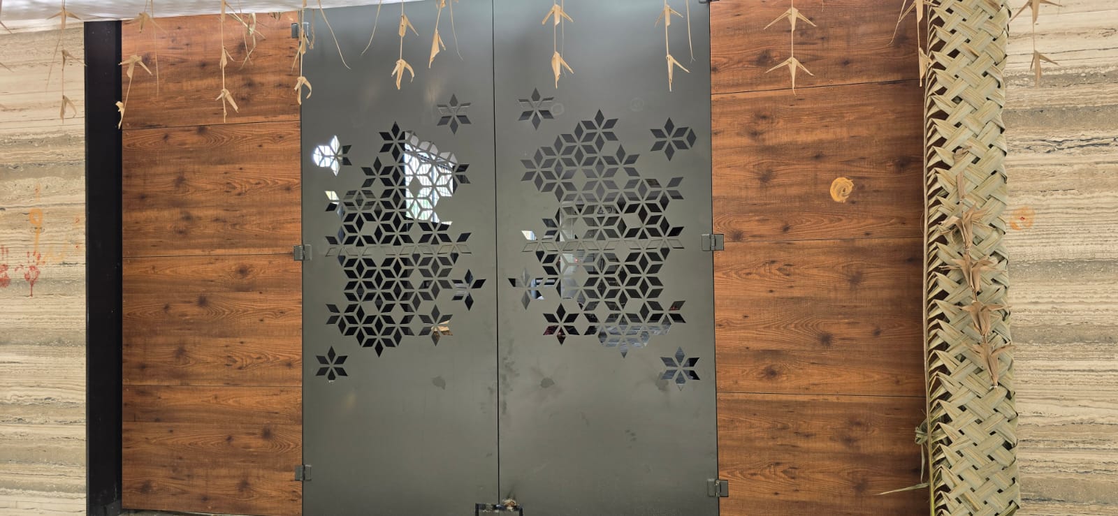 Custom patterned metal gate with geometric cut-outs