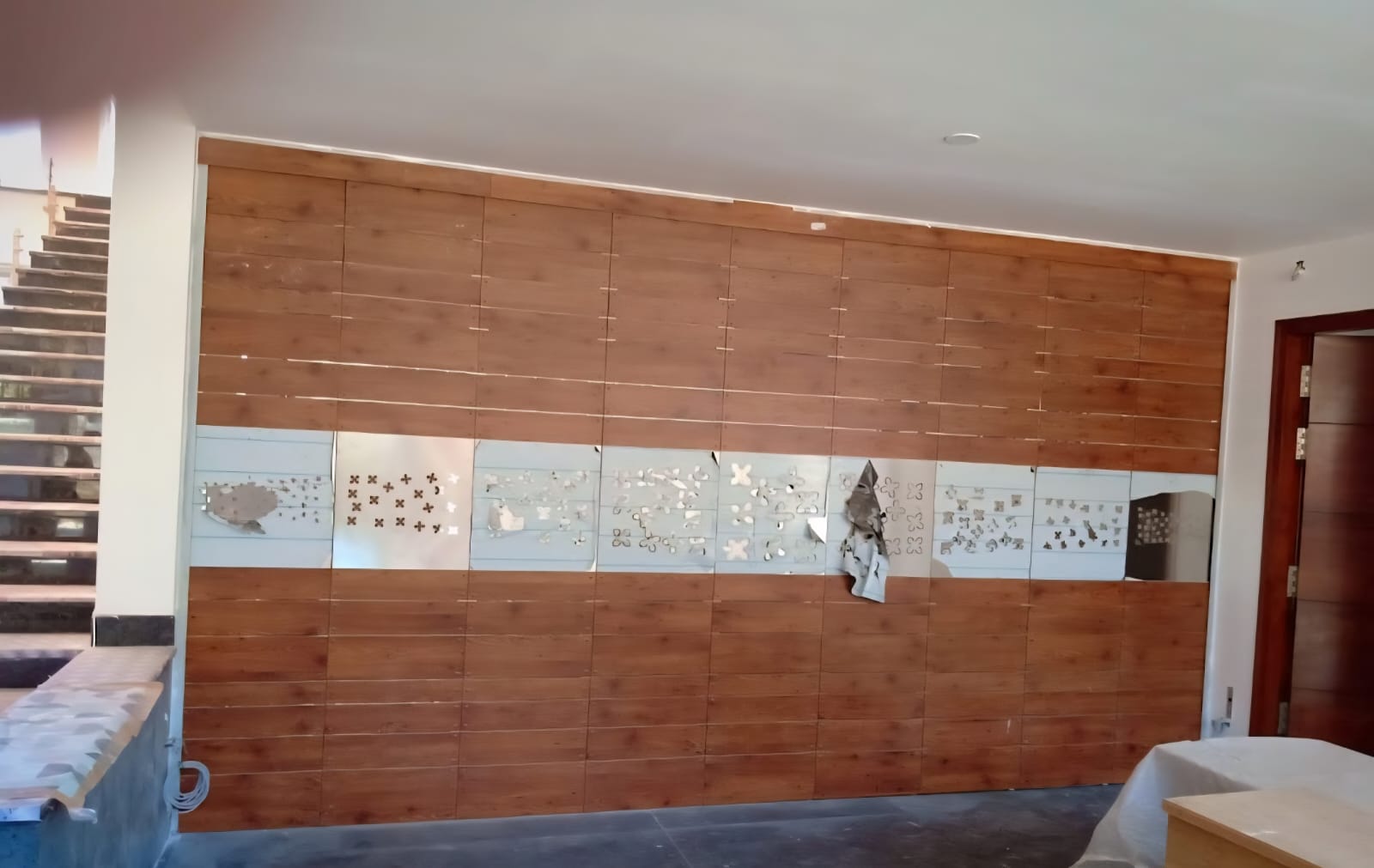 Timber-look shutter with decorative panels